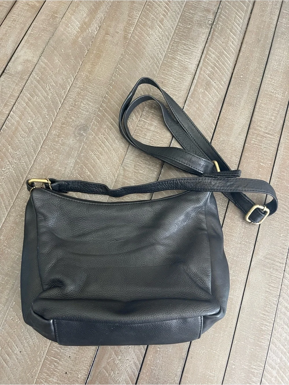 Black Leather Crossbody Bag with Front Zip Pockets and Gold Accents